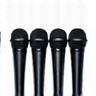 Four microphones arranged for an interview or press conference.